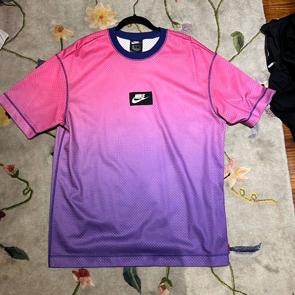 Nike oversized tea. Can be worn as a dress, not see through.